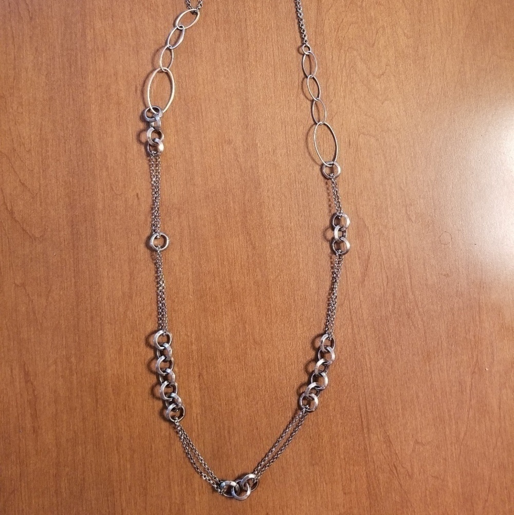 Extra long hoop necklace.